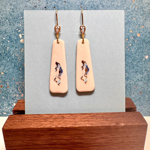 Elegant White Dangle with Blue & Gold Artwork